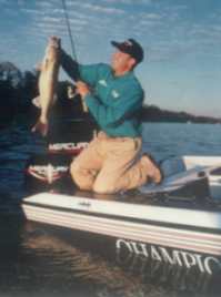 SAm Anderson hoists another fine walleye into the boat.